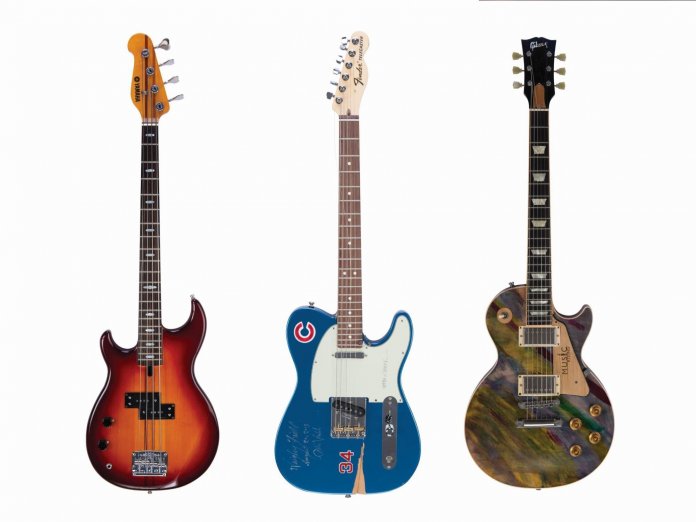 music-rising-auction-guitars@2000x1500-696x522
